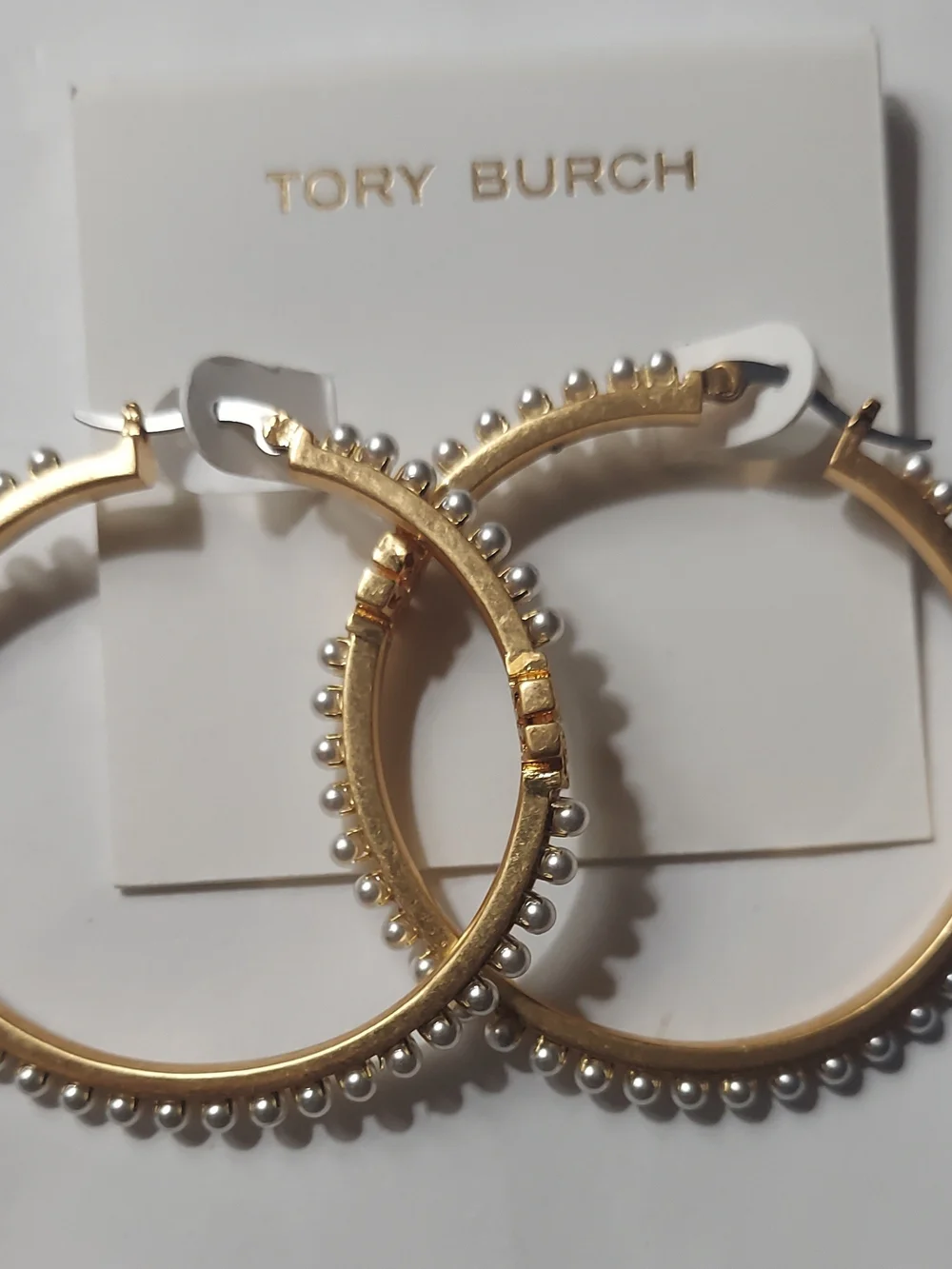 Tory Burch gold tone